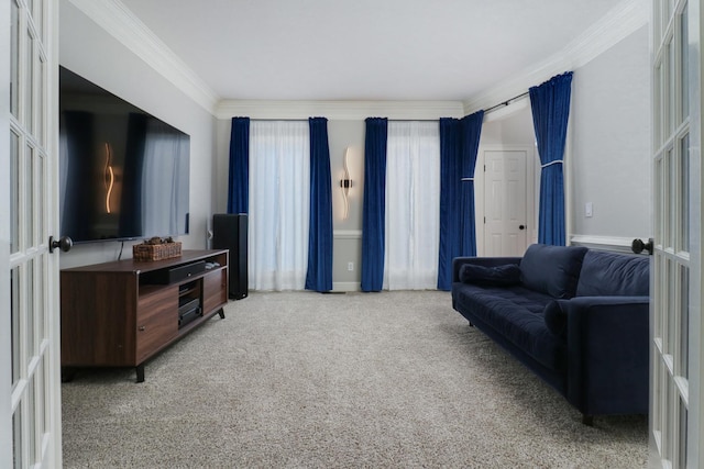 carpeted living room featuring ornamental molding and french doors