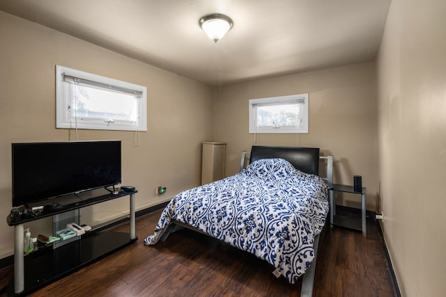 bedroom featuring dark hardwood / wood-style floors