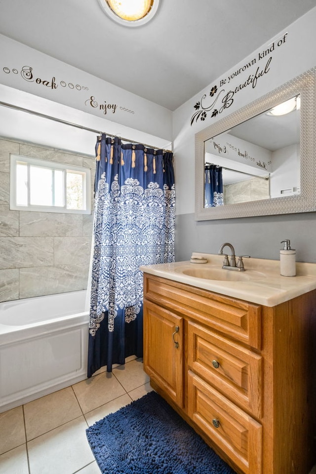 bathroom with tile patterned floors, vanity, and shower / bath combo with shower curtain