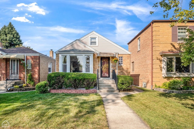 view of front of home with a front lawn