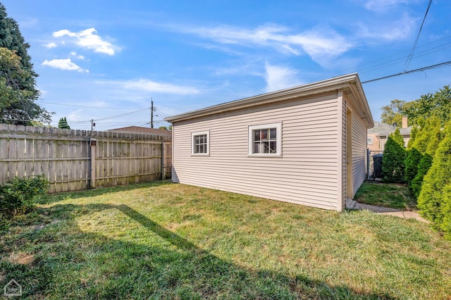 view of side of home featuring a lawn