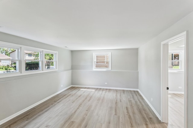 empty room with light wood-type flooring