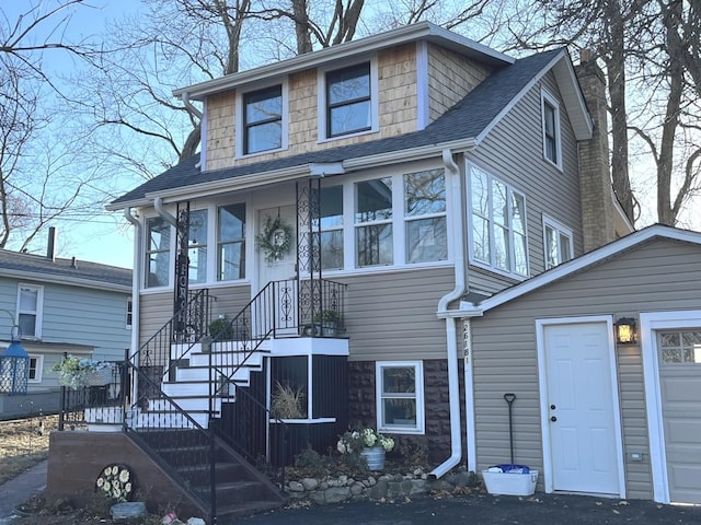 view of front of property with a garage