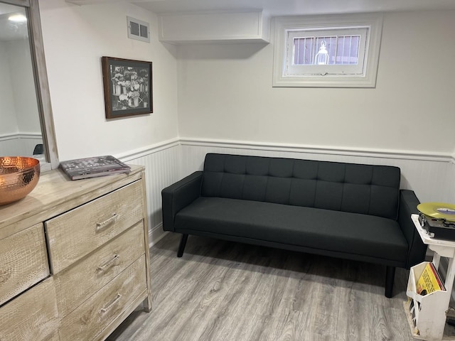 sitting room with light wood-type flooring