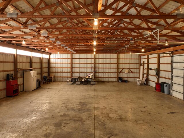 990 E 2800 N Rd, Clifton, IL 60927 - garage with freestanding refrigerator and metal wall