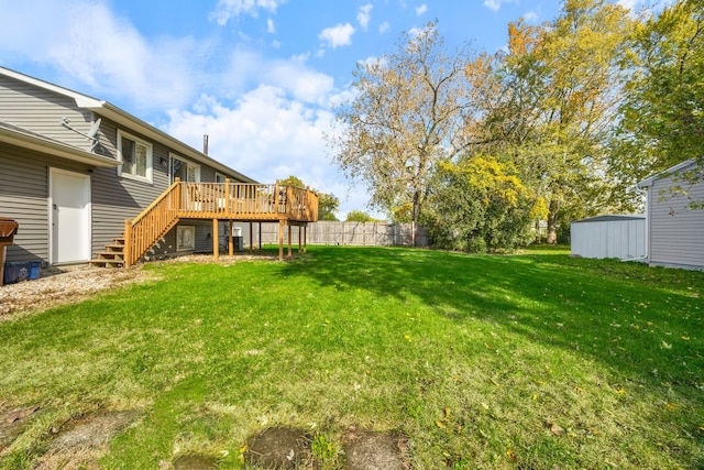 view of yard with a wooden deck