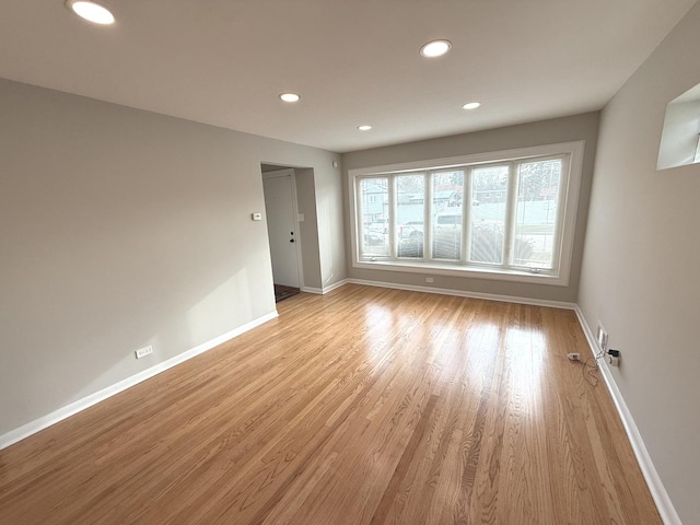 unfurnished room featuring light hardwood / wood-style flooring