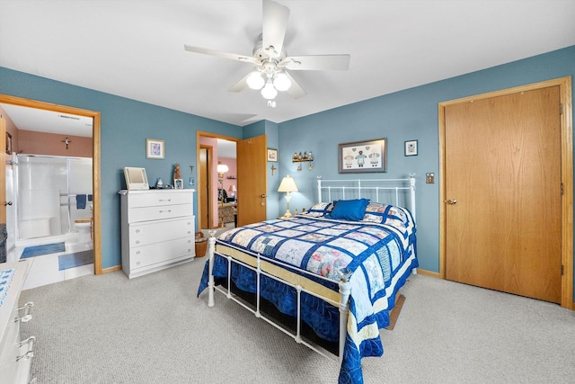 bedroom with light carpet, connected bathroom, and ceiling fan