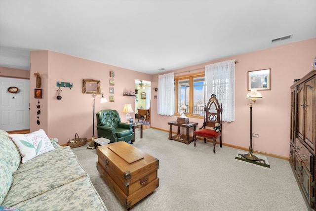 living room featuring light colored carpet