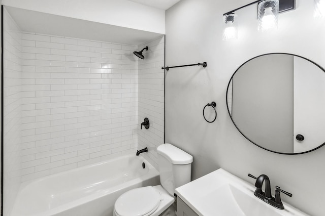 full bathroom with vanity, toilet, and tiled shower / bath