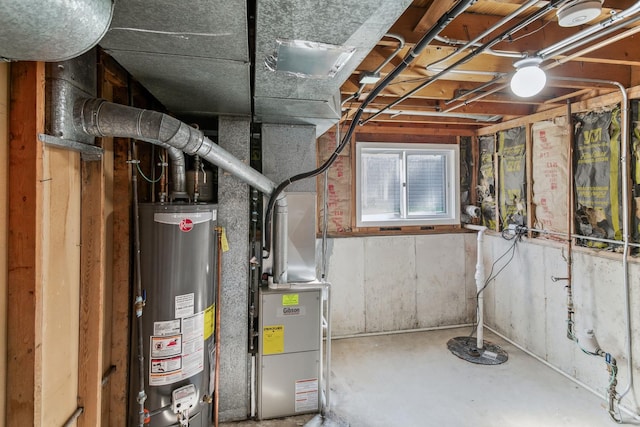 utility room featuring gas water heater