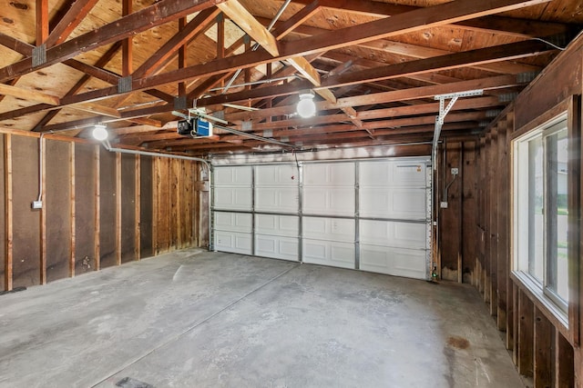 garage featuring a garage door opener