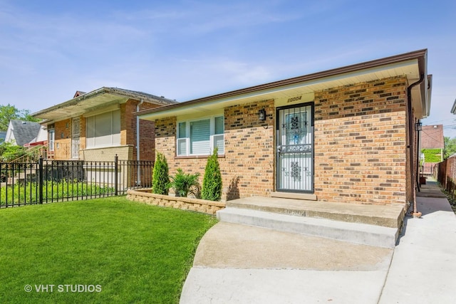 ranch-style house with brick siding, a front lawn, and fence