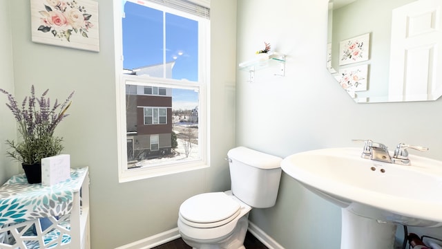 bathroom with sink and toilet