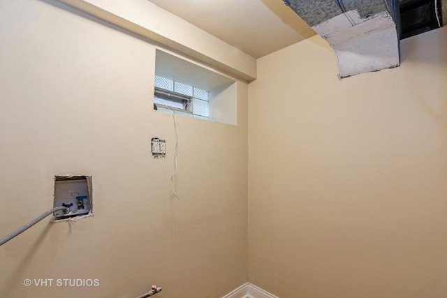 laundry area featuring hookup for a washing machine and laundry area