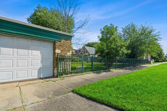 exterior space featuring concrete driveway and fence