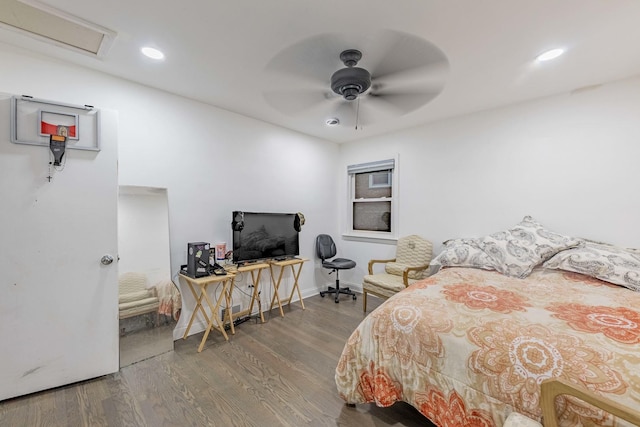 bedroom featuring hardwood / wood-style floors and ceiling fan