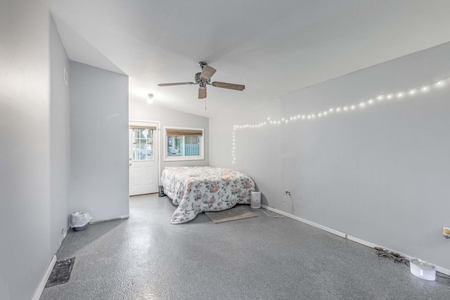 bedroom featuring ceiling fan and vaulted ceiling