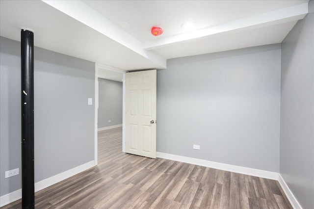 basement with wood-type flooring