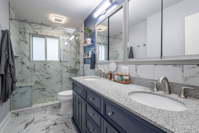 bathroom with vanity, toilet, and an enclosed shower