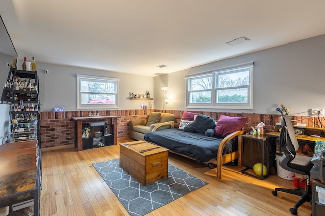 living room with wood-type flooring and a wealth of natural light