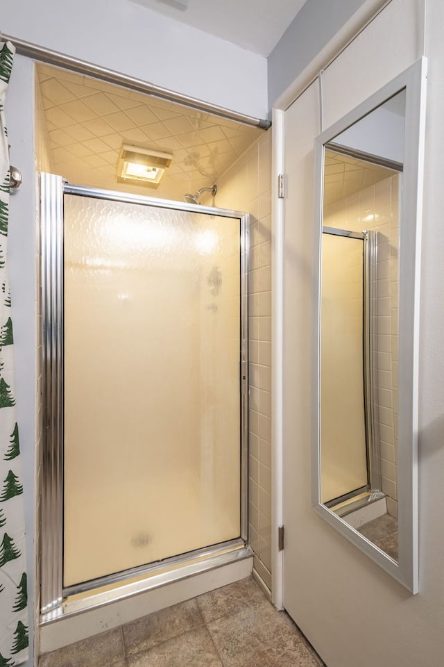 bathroom featuring walk in shower