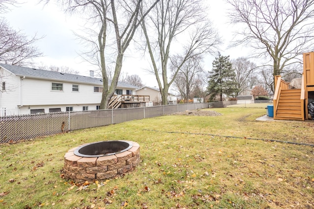 view of yard with an outdoor fire pit