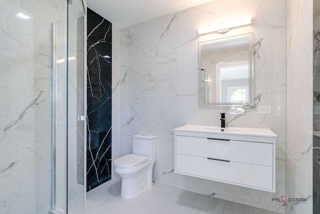 bathroom with walk in shower, vanity, toilet, and tile walls