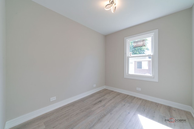 empty room featuring light hardwood / wood-style flooring