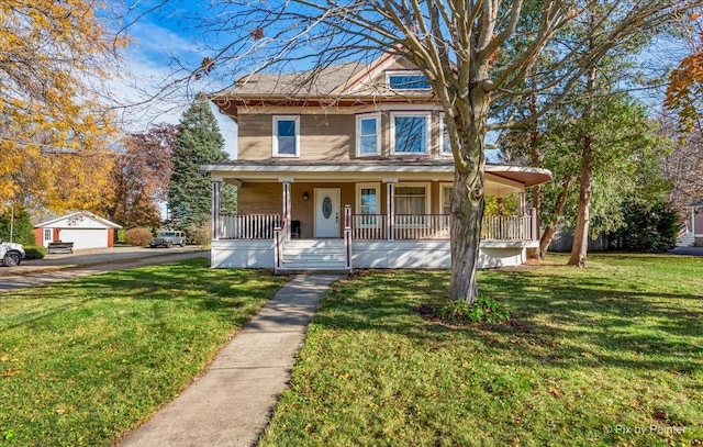 view of front of property featuring a porch, an outdoor structure, a garage, and a front lawn