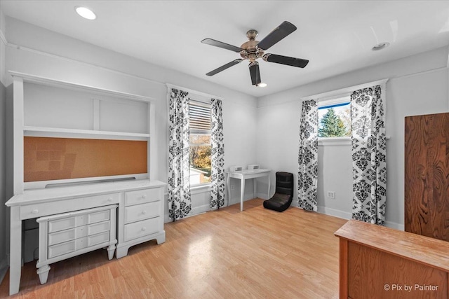 miscellaneous room featuring ceiling fan and light wood-type flooring