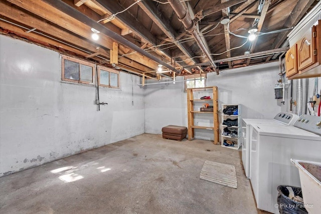 basement featuring separate washer and dryer