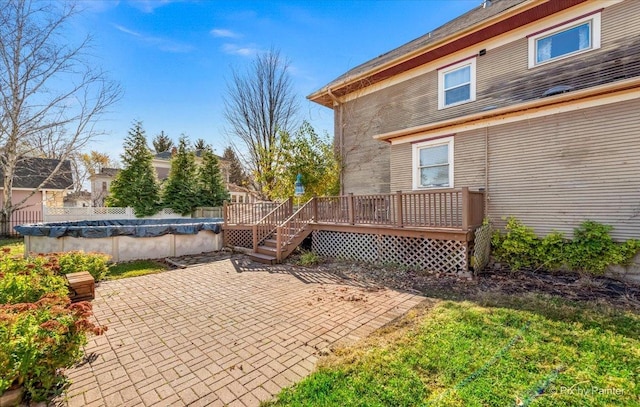 exterior space with a swimming pool side deck