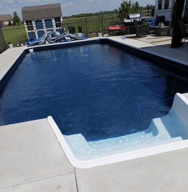 view of pool with a patio