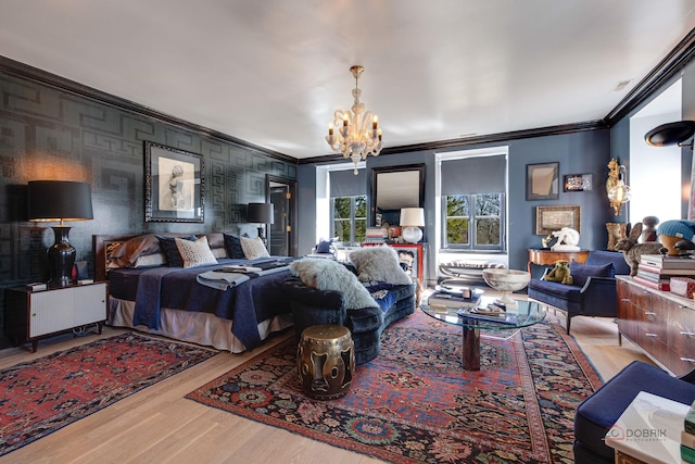 bedroom with a chandelier, light wood-style floors, and crown molding