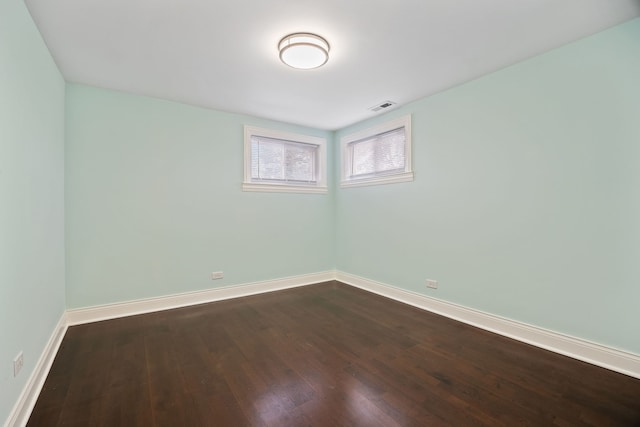 unfurnished room featuring wood-type flooring