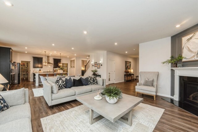 living room with dark wood-type flooring