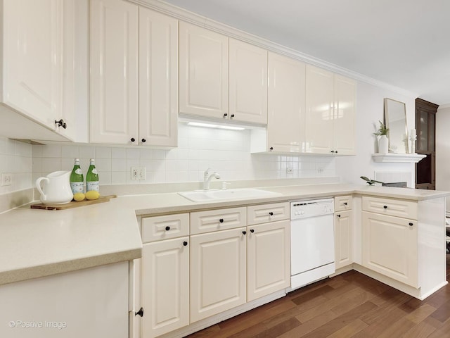 kitchen featuring sink, white cabinets, dark hardwood / wood-style floors, and dishwasher