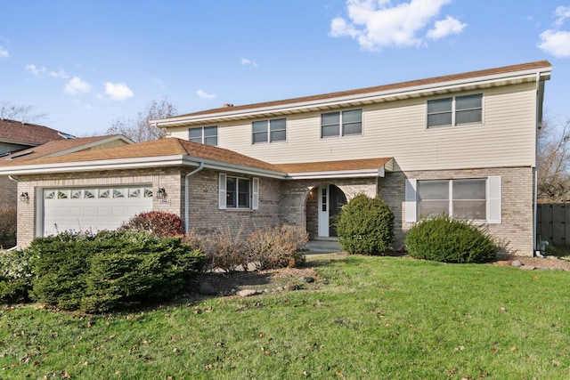 view of property with a front yard and a garage