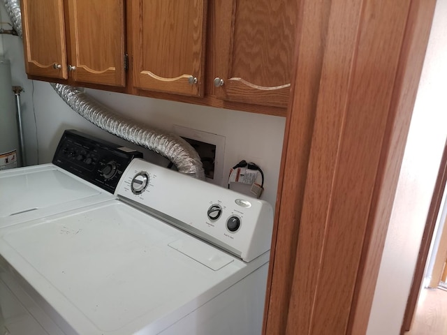 laundry room with cabinets and independent washer and dryer