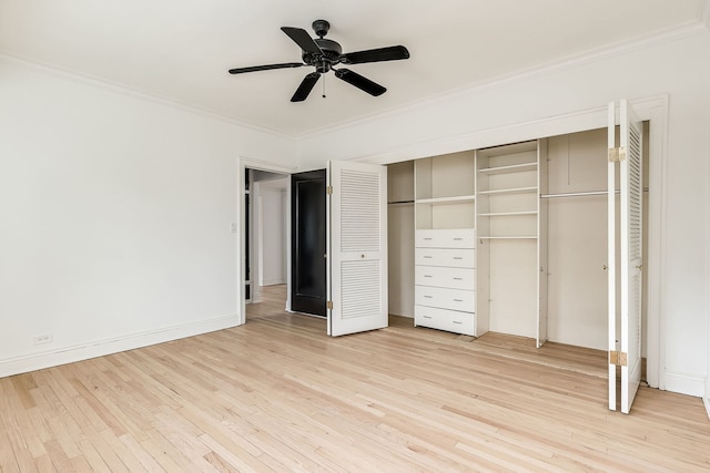 unfurnished bedroom with ceiling fan, light wood-type flooring, and ornamental molding