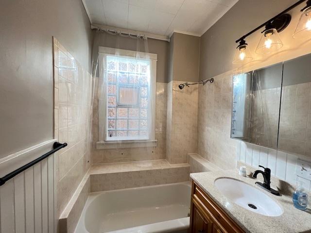 bathroom with vanity and a healthy amount of sunlight