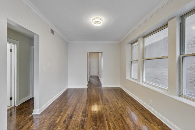 unfurnished room with dark hardwood / wood-style floors and ornamental molding