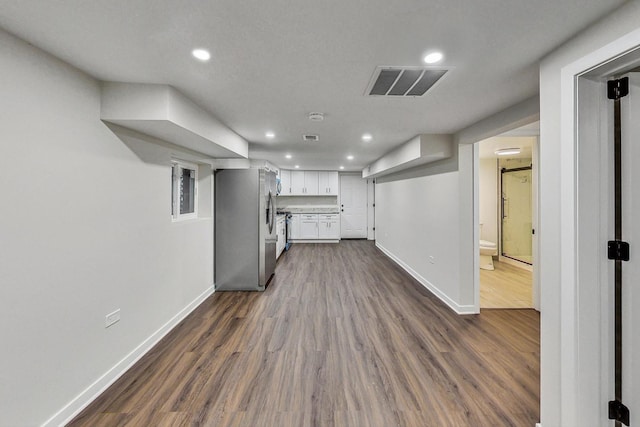 interior space with dark hardwood / wood-style floors