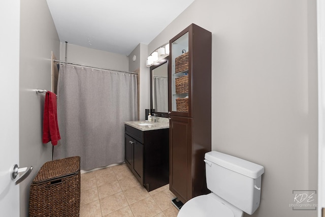 1111 S Wabash Ave Unit 808, Chicago, IL 60605 - bathroom with tile patterned flooring, vanity, toilet, and curtained shower