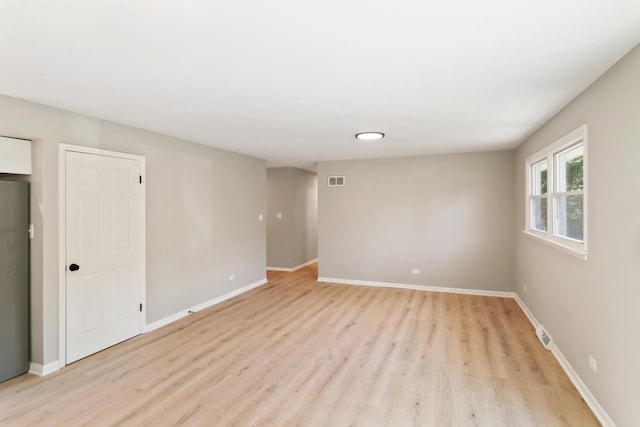 empty room featuring light hardwood / wood-style flooring