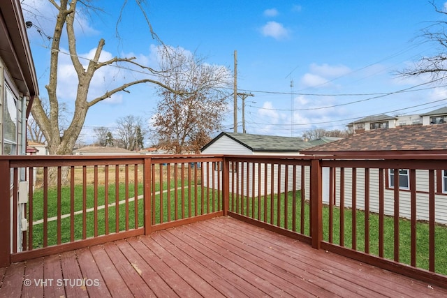 deck featuring a lawn