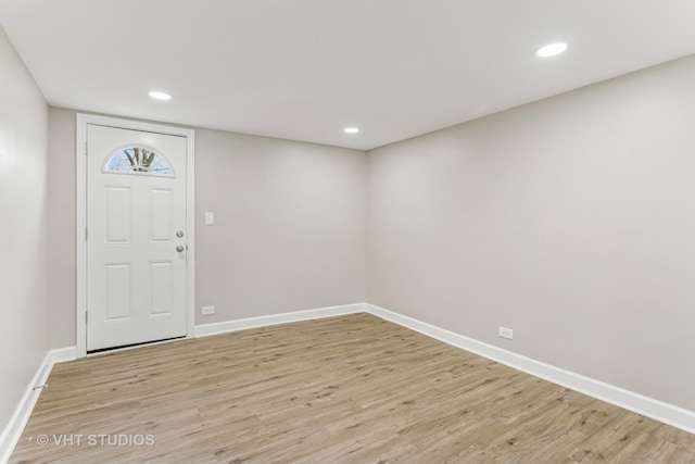 entrance foyer with light hardwood / wood-style flooring