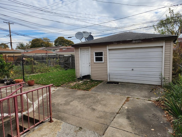 garage with a yard