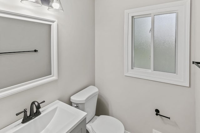 bathroom with toilet and sink